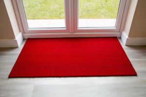Red Entrance Coir Mat Multiple Sizes at an entrance